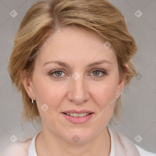 Joyful white adult female with medium  brown hair and blue eyes