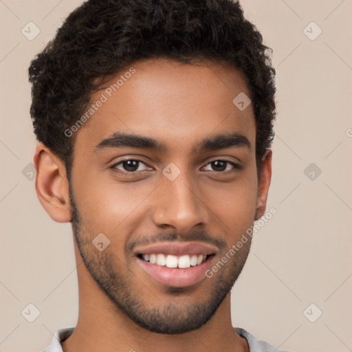 Joyful latino young-adult male with short  brown hair and brown eyes