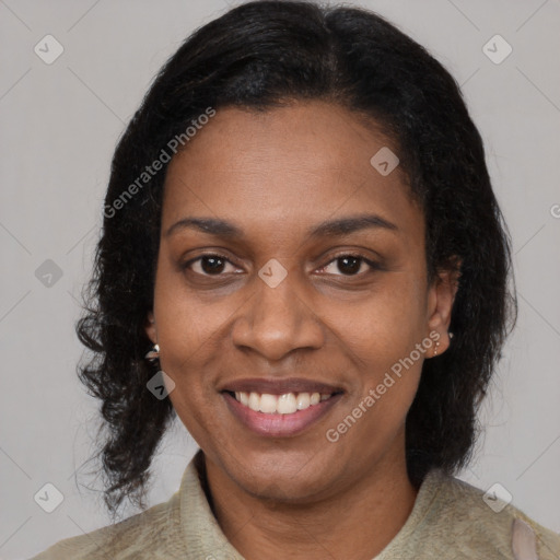 Joyful black young-adult female with medium  black hair and brown eyes