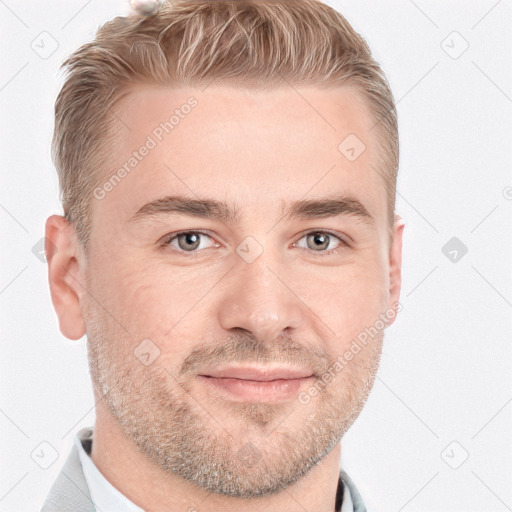 Joyful white adult male with short  brown hair and grey eyes