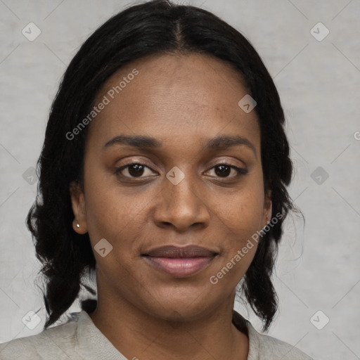 Joyful black young-adult female with medium  black hair and brown eyes