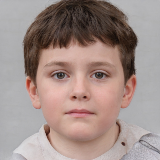 Neutral white child male with short  brown hair and grey eyes