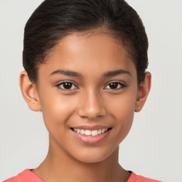 Joyful white child female with short  brown hair and brown eyes