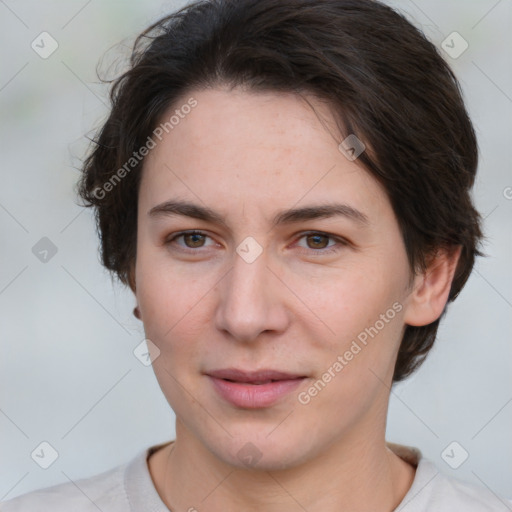 Joyful white young-adult female with short  brown hair and grey eyes