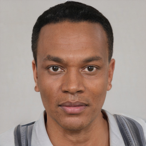 Neutral black young-adult male with short  black hair and brown eyes