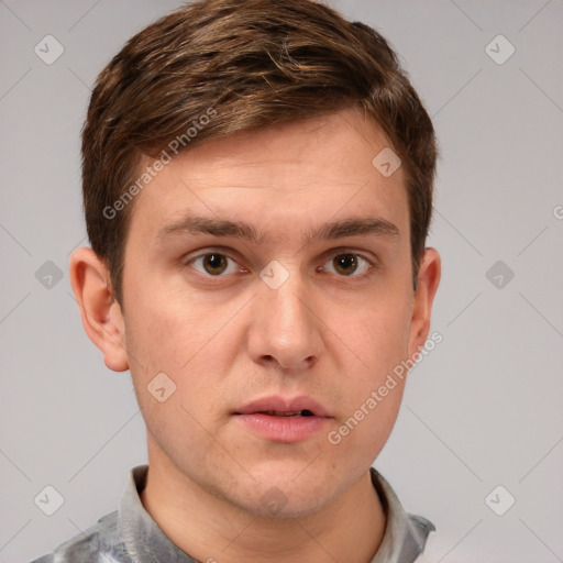 Neutral white young-adult male with short  brown hair and grey eyes