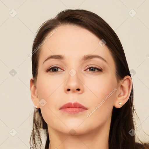 Neutral white young-adult female with long  brown hair and brown eyes