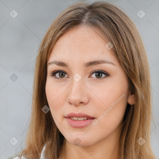 Neutral white young-adult female with long  brown hair and brown eyes