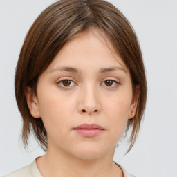 Neutral white young-adult female with medium  brown hair and brown eyes