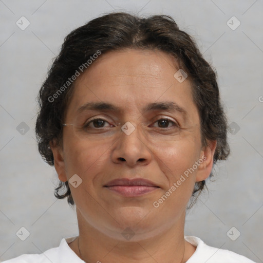 Joyful white adult female with short  brown hair and brown eyes