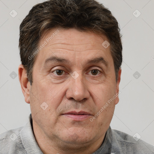 Joyful white middle-aged male with short  brown hair and brown eyes