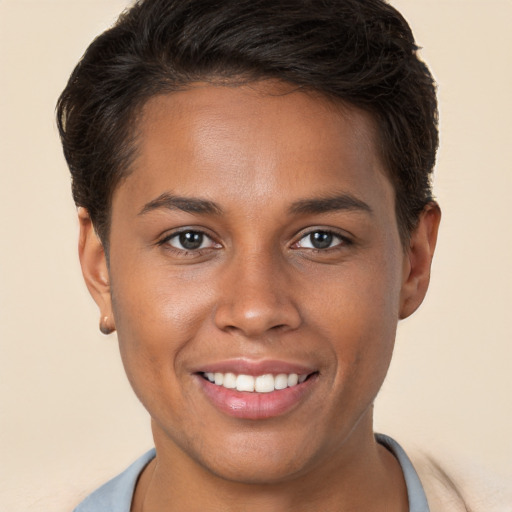 Joyful white young-adult female with short  brown hair and brown eyes