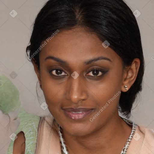 Joyful black young-adult female with medium  brown hair and brown eyes