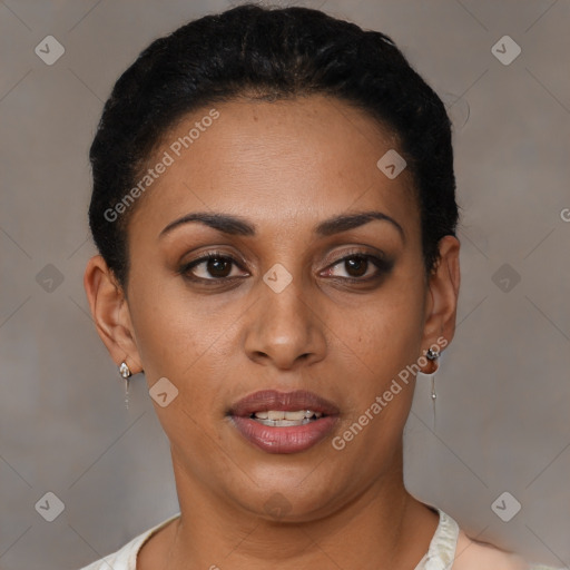 Joyful latino young-adult female with short  black hair and brown eyes
