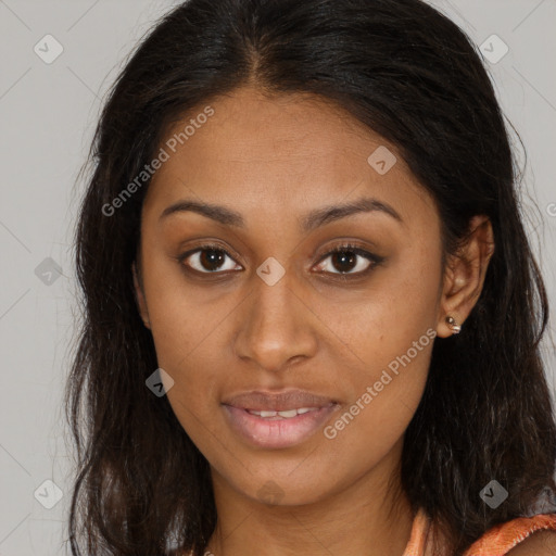 Joyful latino young-adult female with long  brown hair and brown eyes