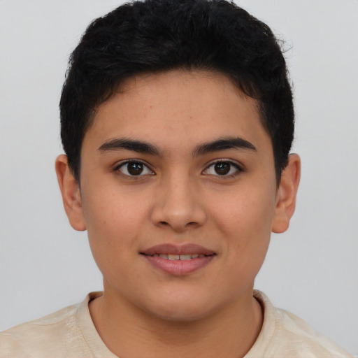 Joyful latino young-adult female with short  brown hair and brown eyes