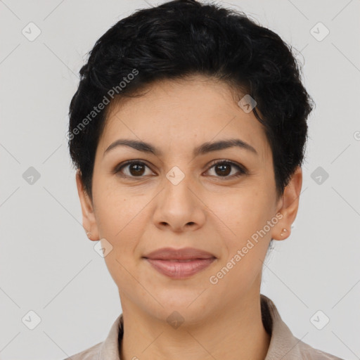 Joyful latino young-adult female with short  black hair and brown eyes