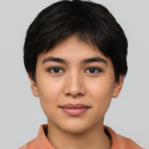 Joyful white young-adult female with short  black hair and brown eyes