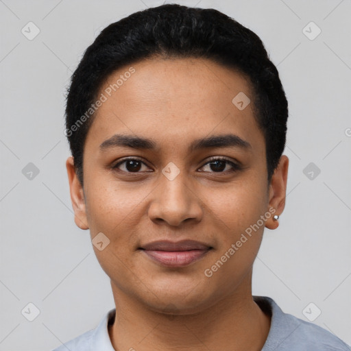 Joyful latino young-adult female with short  black hair and brown eyes