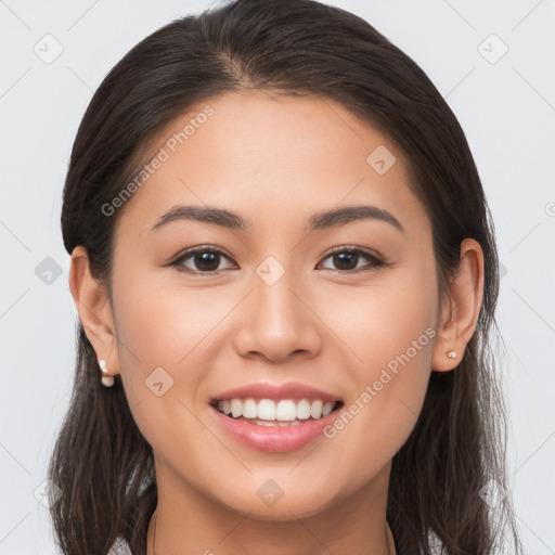 Joyful white young-adult female with long  brown hair and brown eyes