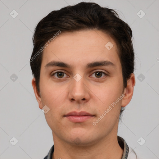 Neutral white young-adult male with short  brown hair and brown eyes