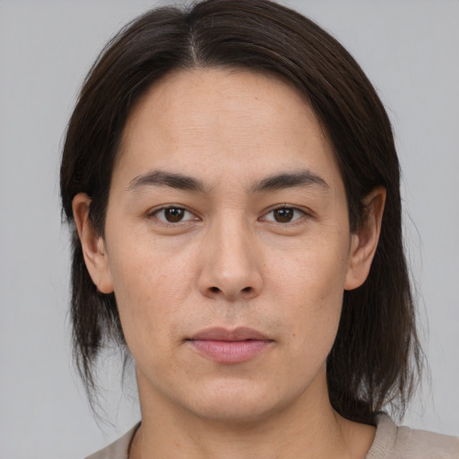 Neutral asian young-adult male with medium  brown hair and brown eyes