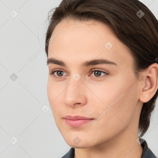 Neutral white young-adult female with medium  brown hair and brown eyes