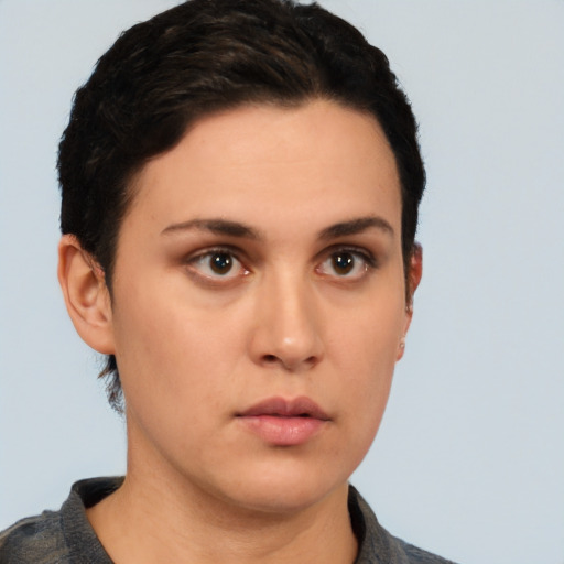 Neutral white young-adult female with short  black hair and brown eyes