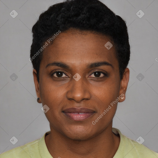 Joyful black young-adult female with short  black hair and brown eyes
