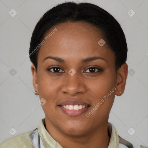 Joyful latino young-adult female with short  black hair and brown eyes