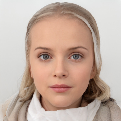 Neutral white young-adult female with medium  brown hair and blue eyes