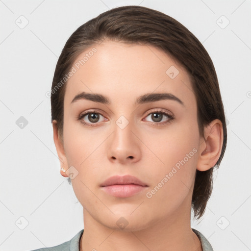 Neutral white young-adult female with medium  brown hair and brown eyes