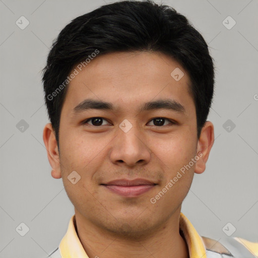 Joyful asian young-adult male with short  brown hair and brown eyes