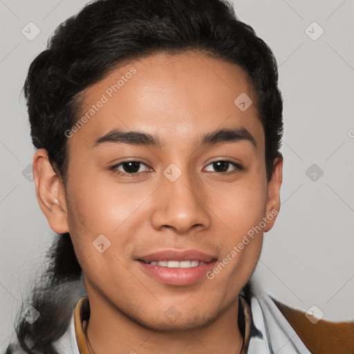 Joyful latino young-adult male with short  brown hair and brown eyes