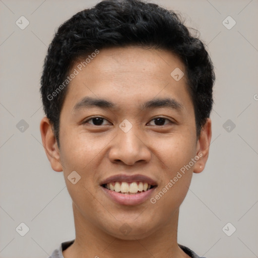 Joyful latino young-adult male with short  black hair and brown eyes