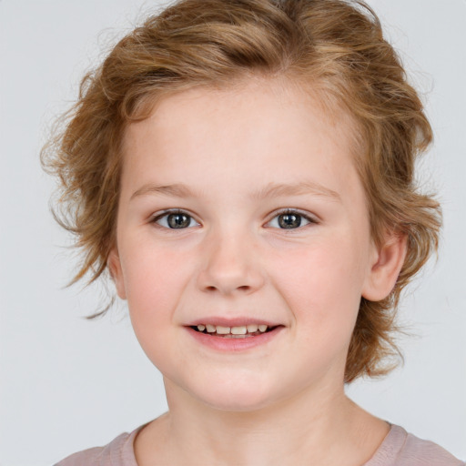 Joyful white child female with medium  brown hair and blue eyes