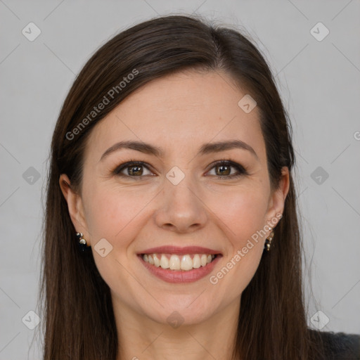 Joyful white young-adult female with long  brown hair and brown eyes