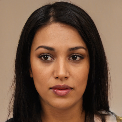 Neutral latino young-adult female with long  brown hair and brown eyes