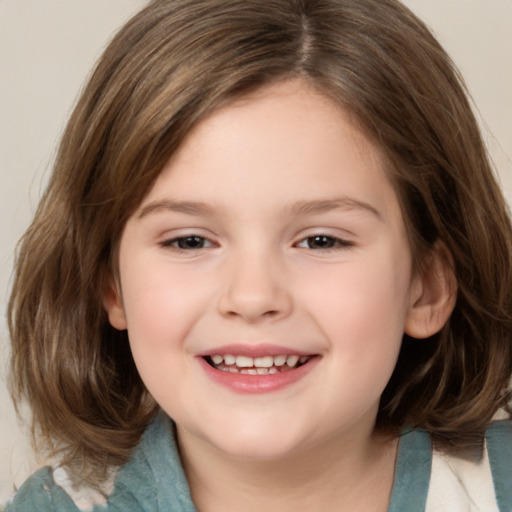 Joyful white child female with medium  brown hair and brown eyes