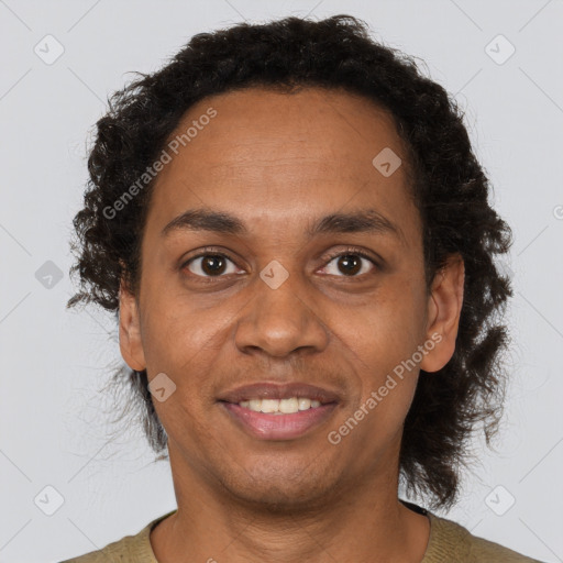 Joyful black adult female with short  brown hair and brown eyes