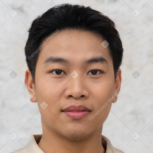 Joyful asian young-adult male with short  black hair and brown eyes