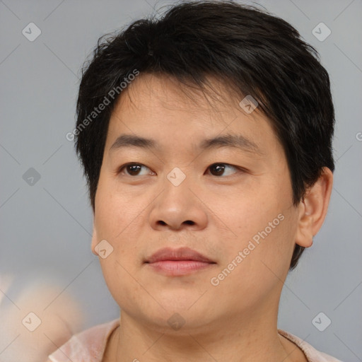 Neutral asian young-adult male with short  brown hair and brown eyes