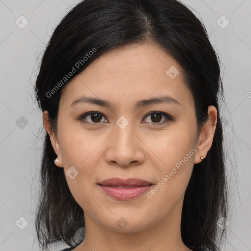 Joyful asian young-adult female with medium  brown hair and brown eyes