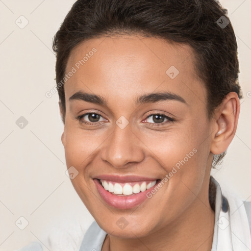 Joyful white young-adult female with short  brown hair and brown eyes