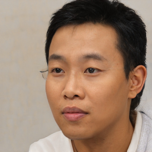Neutral asian young-adult male with short  black hair and brown eyes