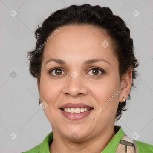 Joyful white adult female with short  brown hair and brown eyes