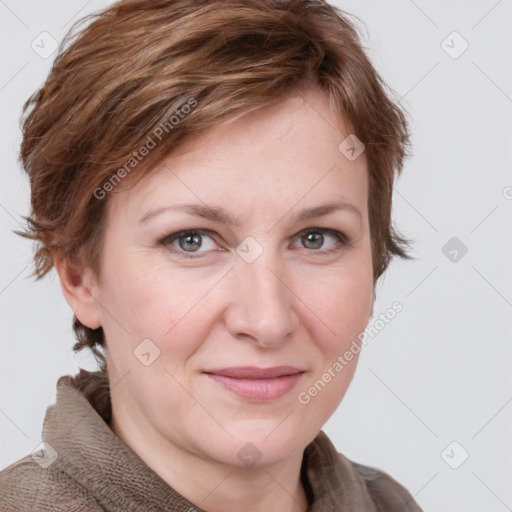 Joyful white adult female with medium  brown hair and blue eyes