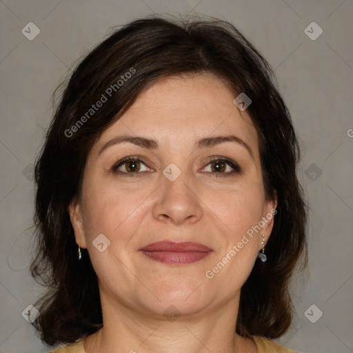 Joyful white adult female with medium  brown hair and brown eyes