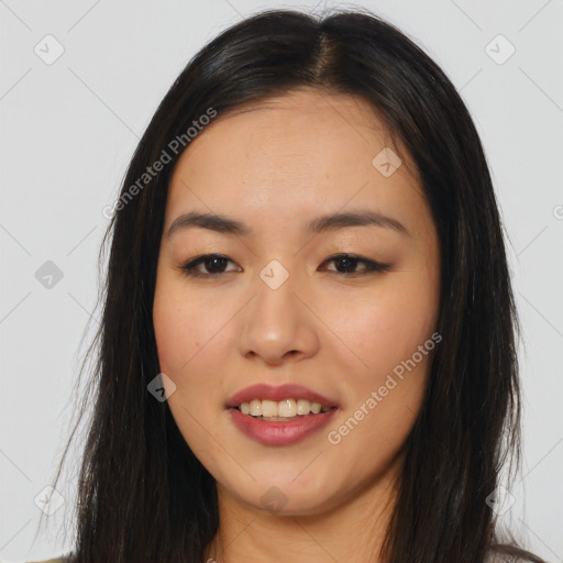 Joyful asian young-adult female with long  brown hair and brown eyes