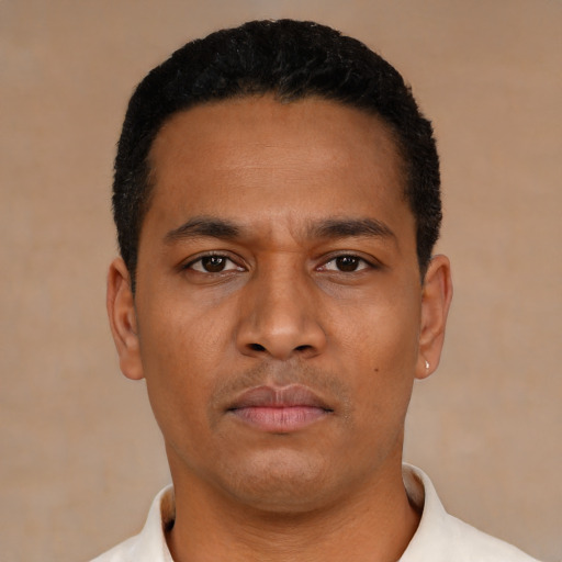 Neutral latino young-adult male with short  black hair and brown eyes